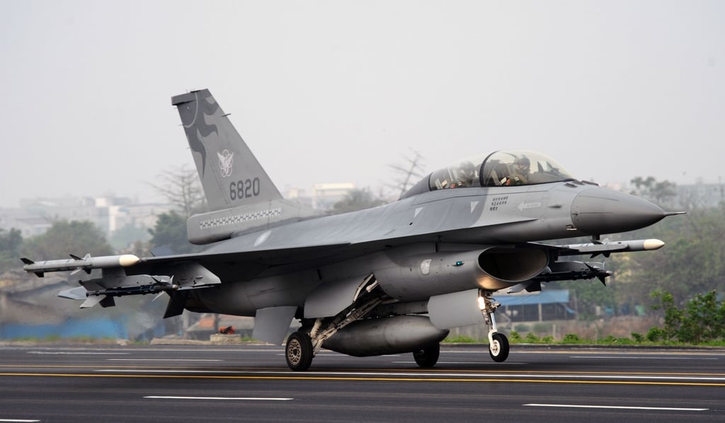 A US-made F-16 fighter landing on a highway near southern Tainan city in Taiwan during a drill. Photo: AFP