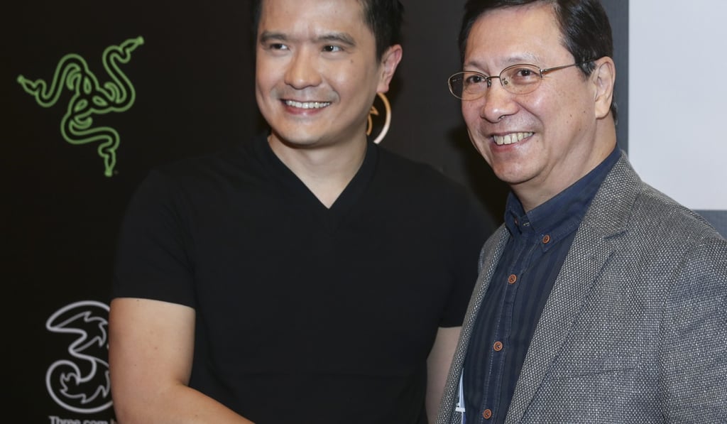 Three Group launches its new gaming alliance last month with Razer: Tan Min-Liang (left), Razer co-founder and chief executive officer, with Cliff Woo Chiu-man, Hutchison Telecom chief executive officer. Photo: K. Y. Cheng