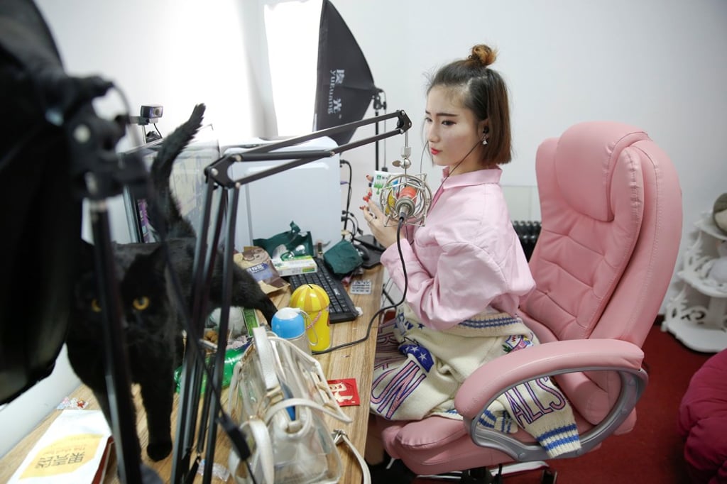 A girl broadcasts at live streaming talent agency Three Minute TV in Beijing. Photo: Reuters