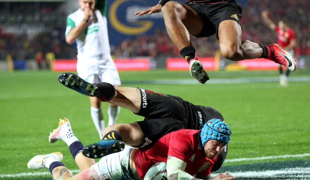 British & Irish Lions' Jack Nowell (centre) dives in for a try against the Waikato Chiefs. Photo: AFP