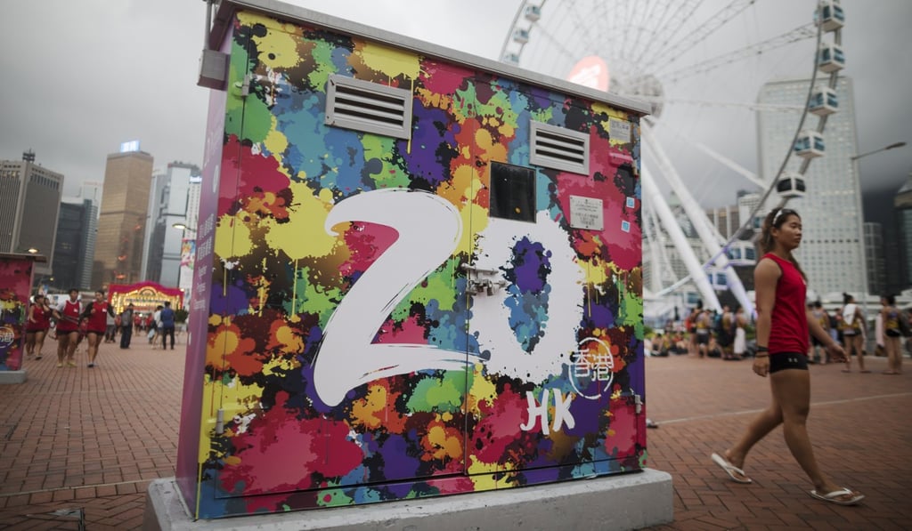 Advertising for the 20th anniversary of the handover is displayed on the Central Harbour waterfront in Hong Kong. By thinking from only a Hong Kong perspective, the Democratic Party displays a lack of consideration for the nation and national identification. Photo: EPA Advertising for the 20th anniversary of the handover is displayed on the Central Harbour waterfront in Hong Kong. By thinking from only a Hong Kong perspective, the Democratic Party displays a lack of consideration for the nation and national identification. Photo: EPA