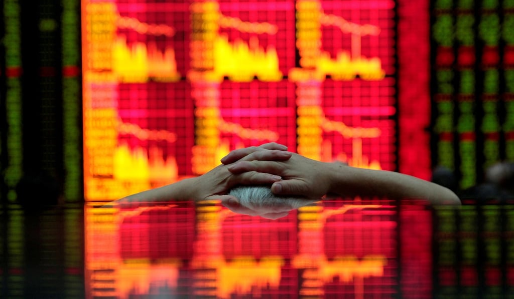 An electronic board at a brokerage house in Shanghai. Photo: Reuters