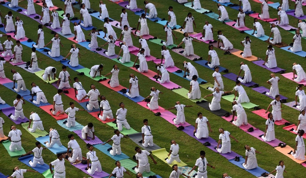 Indian students take part in a yoga session on International Yoga Day in Chennai. Photo: AFP