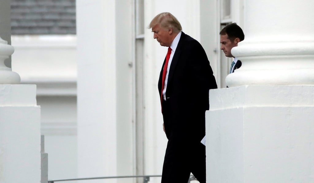 US President Donald Trump leaves the White House in Washington. Photo: Reuters