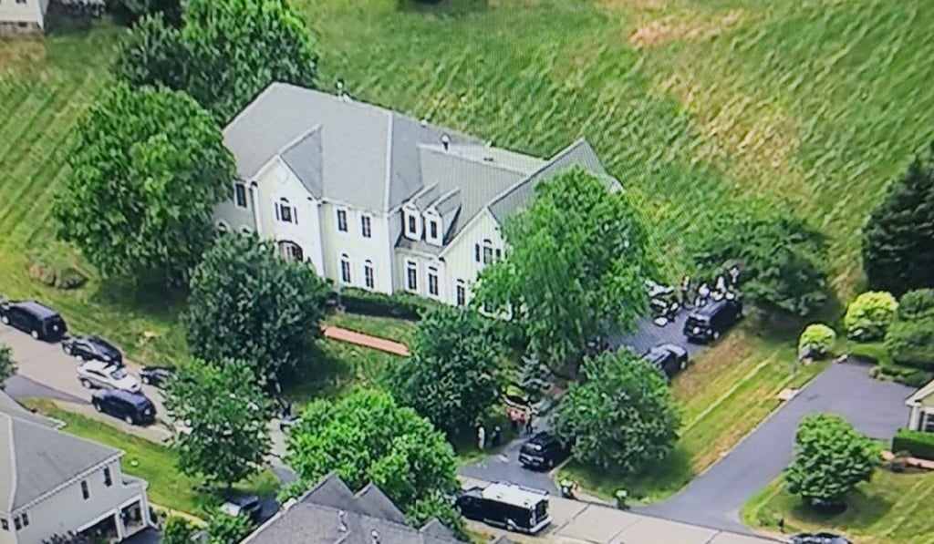 FBI agents raid the home of Kevin Mallory on Thursday, outside Washington. Photo: ABC 7 FBI agents raid the home of Kevin Mallory on Thursday, outside Washington. Photo: ABC 7