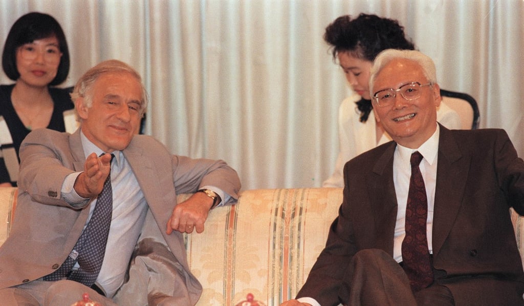 David Wilson (left), who was the outgoing governor of Hong Kong, chats with Lu Ping, then director of the Chinese State Council's Hong Kong and Macau Affairs Office. Photo: Sam Chan