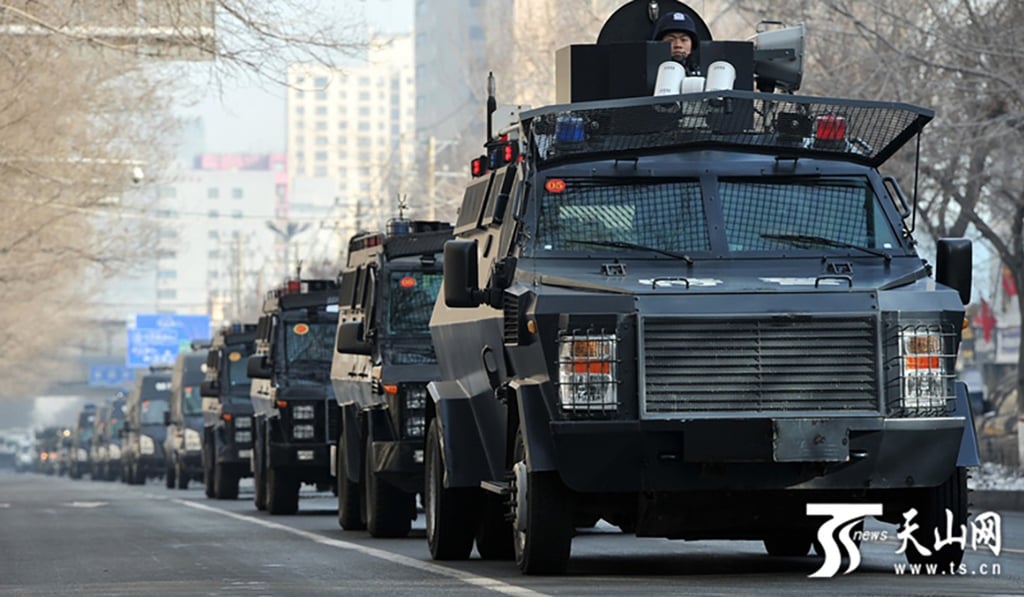 Security forces stage a demonstration of force in Xinjiang in February. Photo: Handout