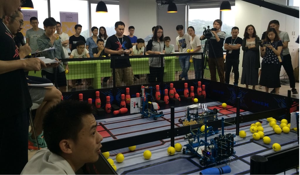 Makeblock’s makeathon participants take part in a robot competition in the company’s canteen in Shenzhen, China. Photo: Coco Liu Makeblock’s makeathon participants take part in a robot competition in the company’s canteen in Shenzhen, China. Photo: Coco Liu