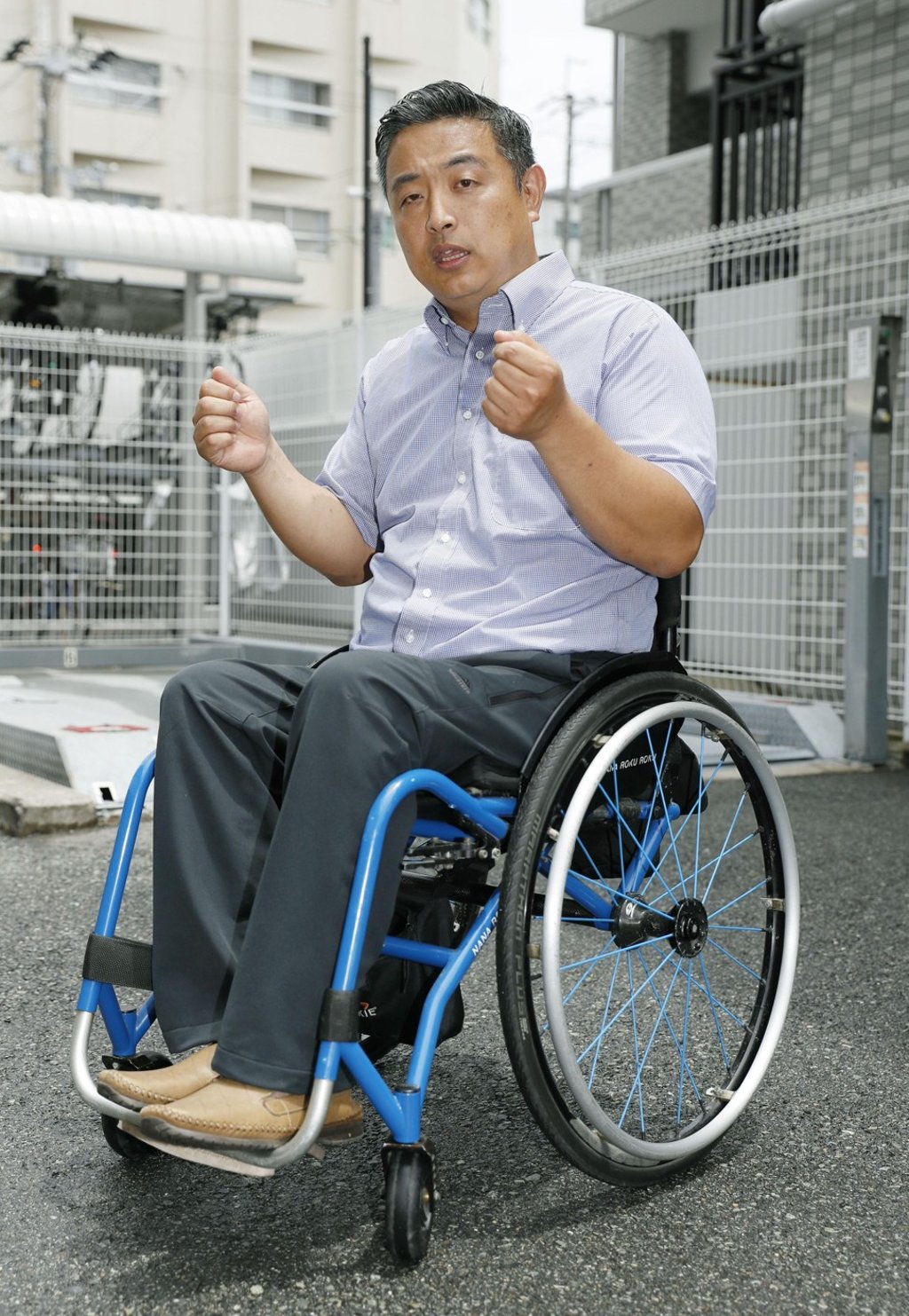 Hideto Kijima: made to crawl up stairs to board flight. Photo: Kyodo