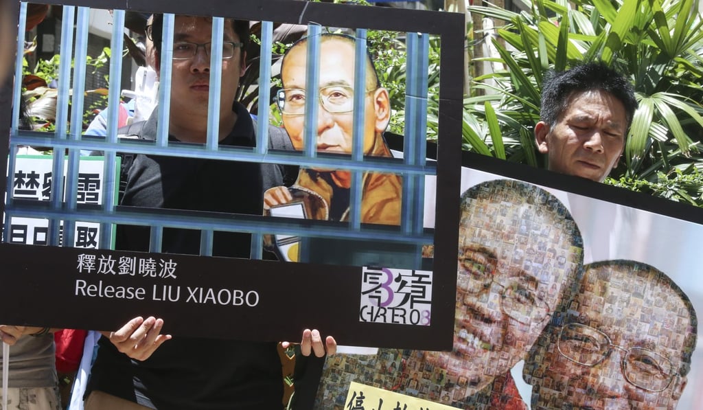 Protesters outside the Western Police Station marched to the Central Liaison Office on June 27, 2017 to call for the full release of Liu Xiaobo. Photo: K. Y. Cheng