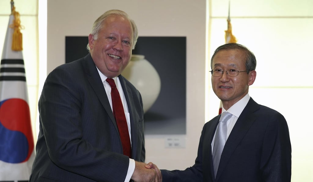 South Korea's Vice-Foreign Minister Lim Sung-nam and US Under Secretary of State Thomas Shannon shake hands ahead of their talks in Seoul on June 14. Photo: EPA South Korea's Vice-Foreign Minister Lim Sung-nam and US Under Secretary of State Thomas Shannon shake hands ahead of their talks in Seoul on June 14. Photo: EPA