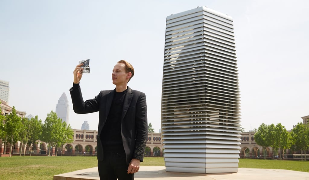 Daan Roosegaard in front of his “Smog-Free Tower”. Photo: Studio Roosegaarde