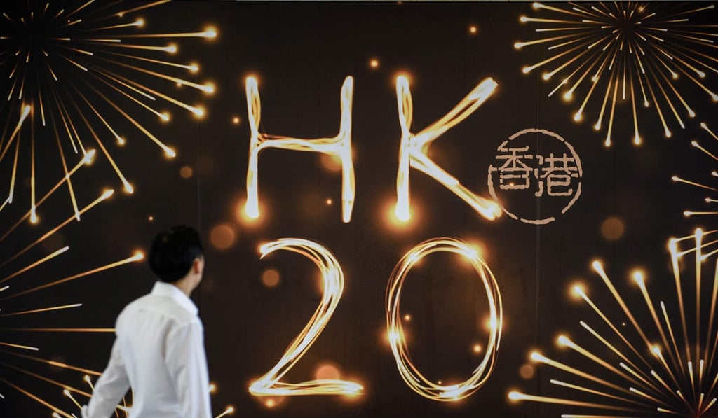 A poster celebrates the handover anniversary. Photo: AFP