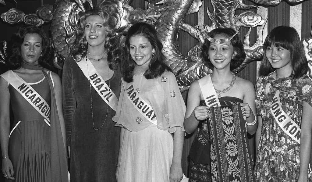 Miss Hong Kong, Rowena Lam (right), with other contestants at an Urban Council cocktail reception. Miss Hong Kong, Rowena Lam (right), with other contestants at an Urban Council cocktail reception.
