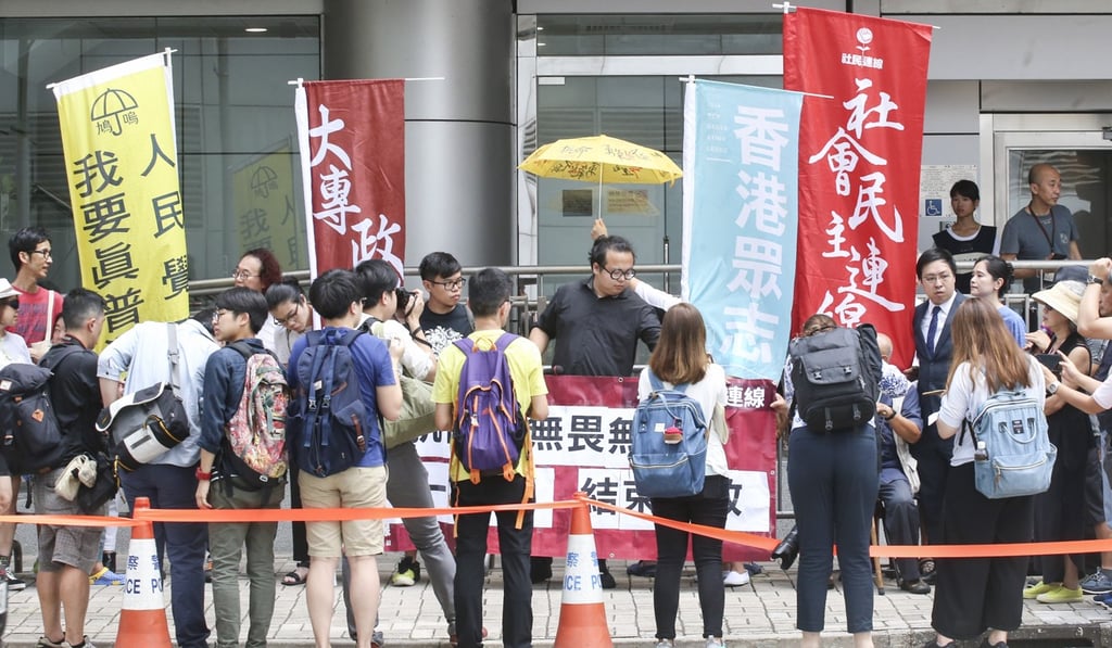 Activists protested outside North Point Police Station as the 26 were held. Photo: David Wong