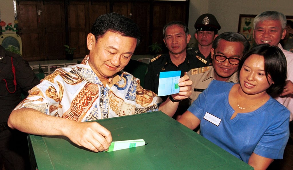 Thaksin Shinawatra casts his ballot at polling station in Bangkok in 2001. The Asian financial crisis paved the way for his landslide victory. Photo: AP