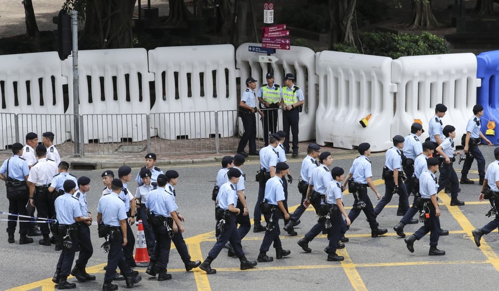 Police on Harbour Road in Wan Chai for the Chinese president’s arrival. Photo: Edward Wong