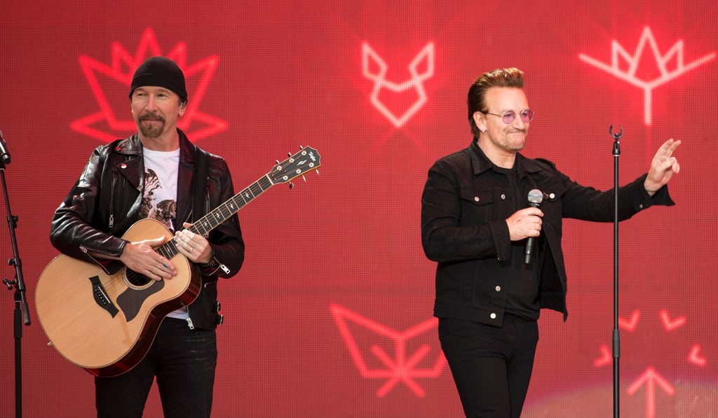 Musicians The Edge (L) and Bono of U2 perform as part of celebrations for Canada's 150th birthday on Parliament Hill. Photo: AFP Musicians The Edge (L) and Bono of U2 perform as part of celebrations for Canada's 150th birthday on Parliament Hill. Photo: AFP