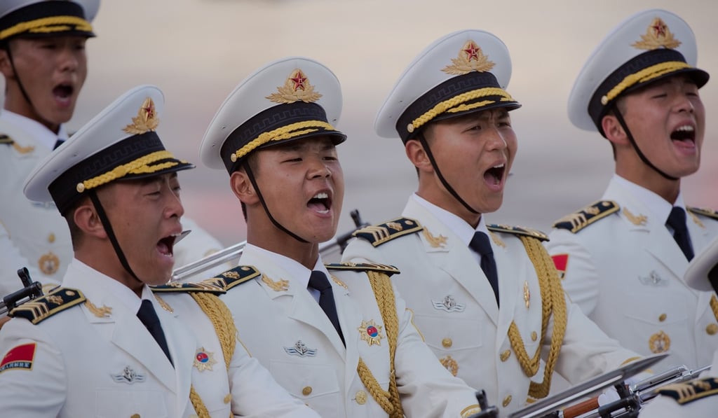 A Chinese military honour guard welcomes Afghanistan’s Chief Executive Officer Abdullah Abdullah to Beijing. Photo: AFP