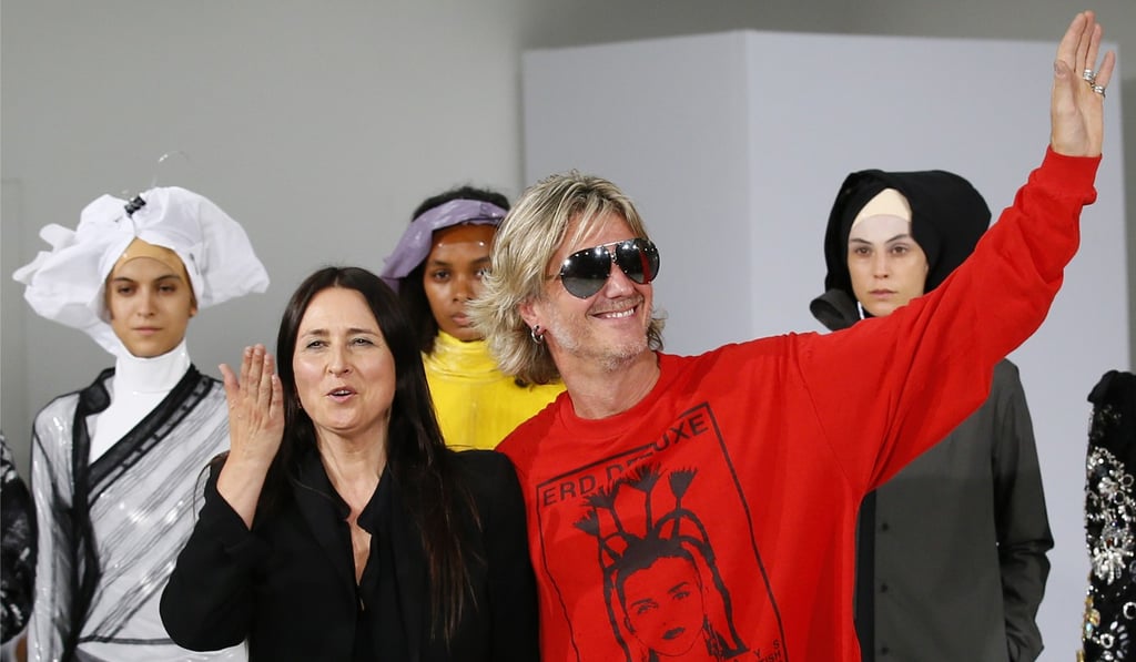 Belgian fashion designers An Vandevorst and Filip Arickx acknowledge audience applause after the presentation of the A.F. Vandevorst Haute Couture show in Paris on Sunday. Photo: AP