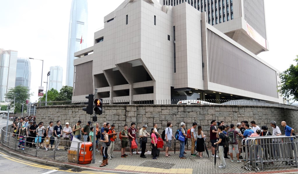 People queue for tickets outside the Admiralty PLA camp. Photo: Dickson Lee