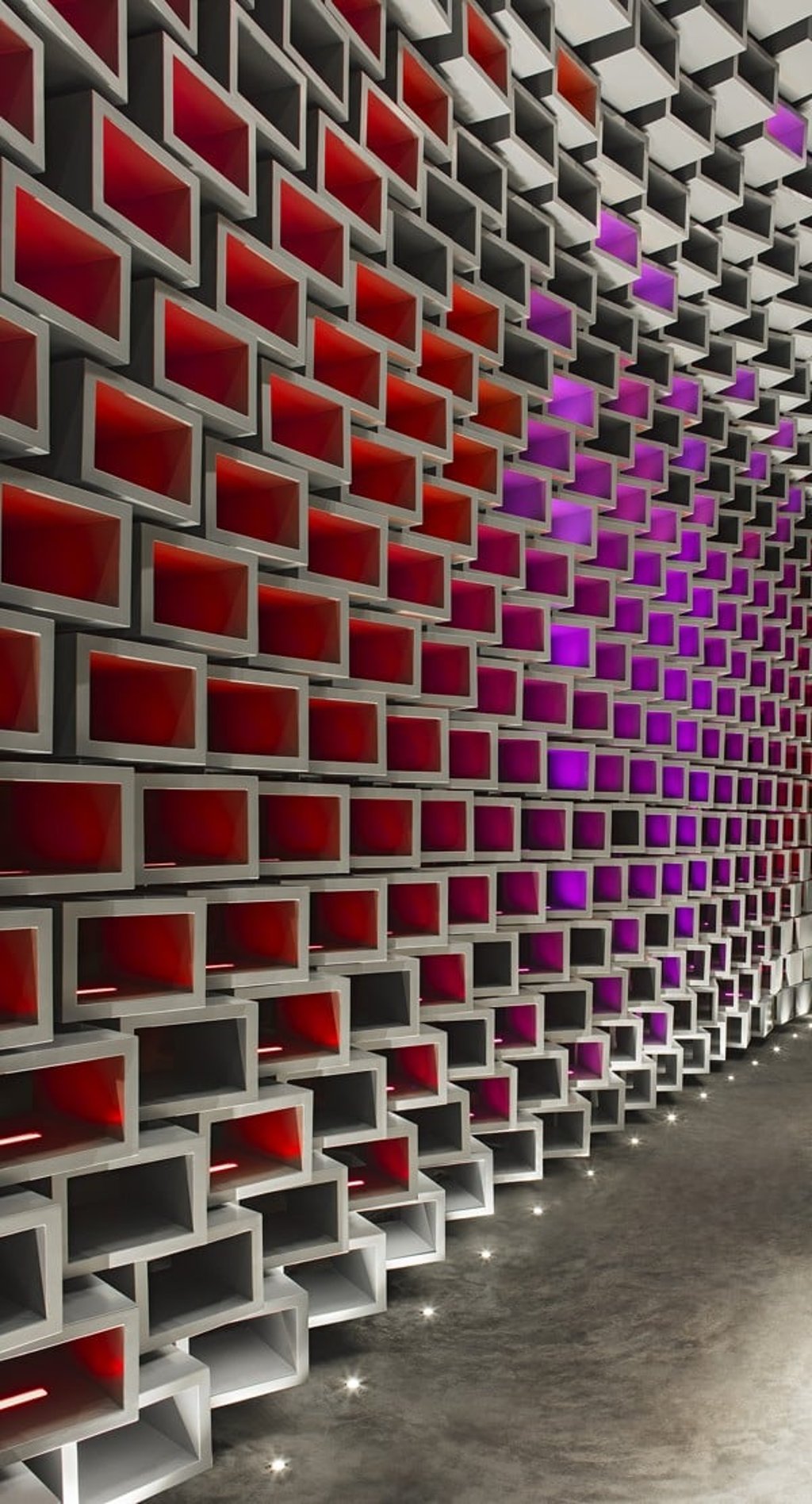 The gate leads to the facade of the “open box” of ArtisTree, made up of 1,000 squares that can be repositioned and lit in various ways. Photo: SCMP handout.