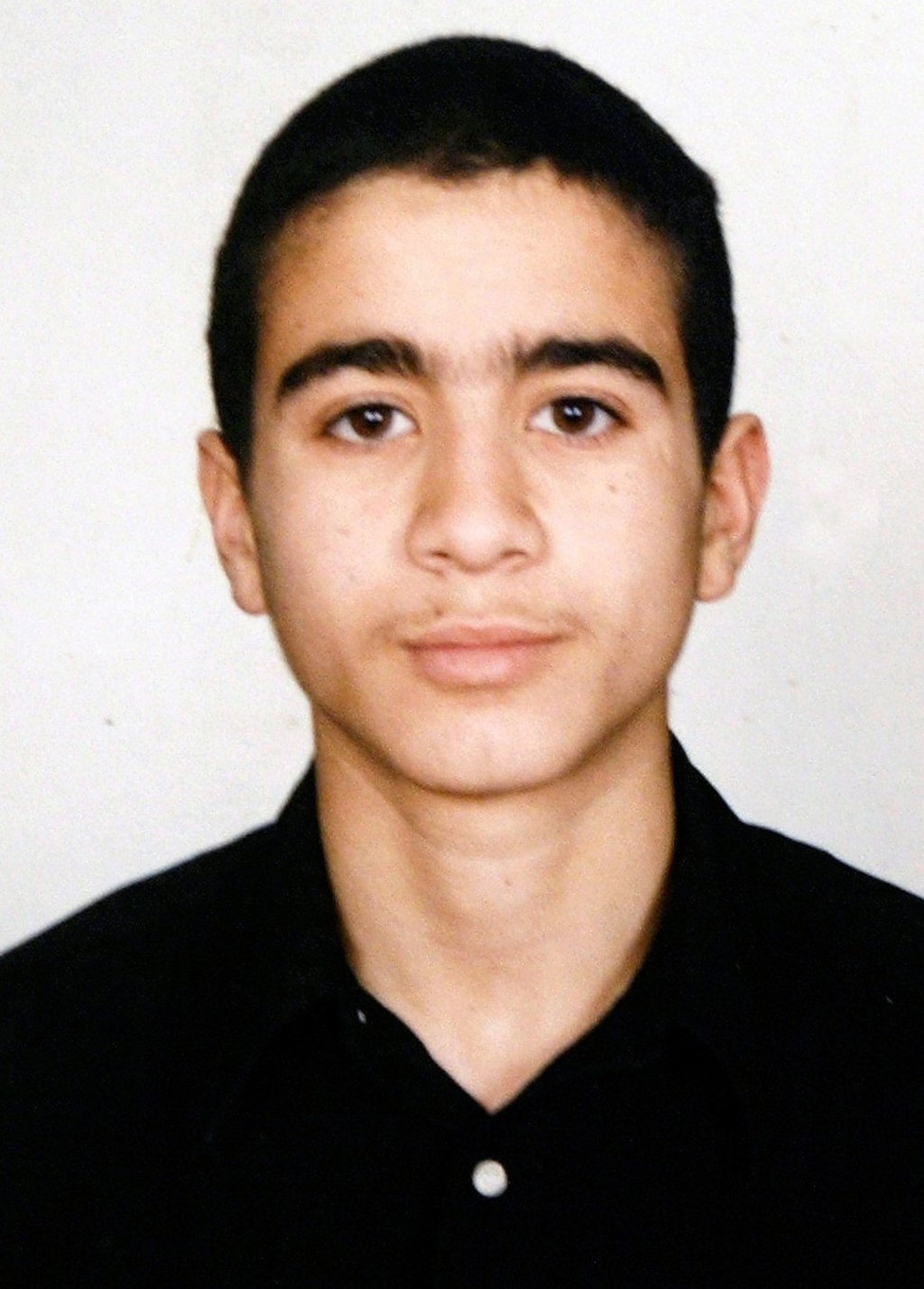 Omar Khadr is seen in an undated family handout photo. Khadr, who was a 15-year-old fighting in Afghanistan when captured in 2002, was sent to finish his sentence in his native Canada on September 29, 2012. Photo: Reuters