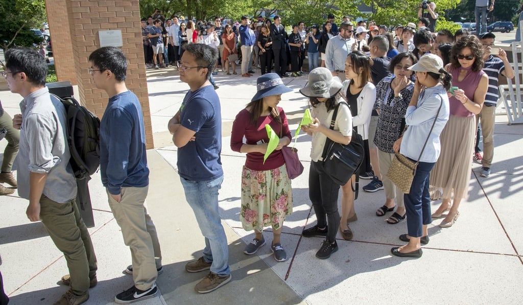 People line up outside the federal courthouse for first appearance of Brendt Christensen, the suspect in the kidnapping of Zhang Yingying. Photo: AP
