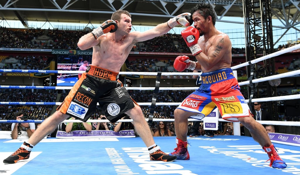 Manny Pacquiao is struck by Jeff Horn at Suncorp Stadium in Brisbane.