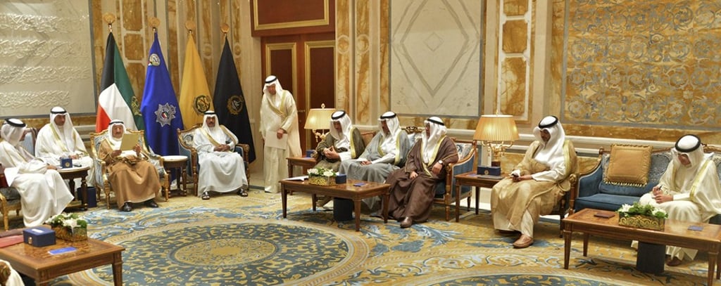Mohammed bin Abdulrahman Al Thani hands over a letter from Qatar’s emir to the Emir of Kuwait Sheikh Sabah Al Ahmad Al Sabah. Photo: EPA