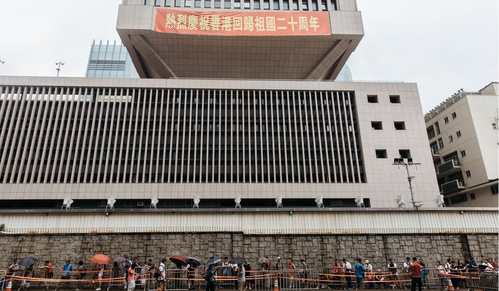 Only 2,000 tickets were handed out for the public tours of the Liaoning aircraft carrier. Pictured, a line outside the PLA's local headquarters in Hong Kong on Monday. Photo Bloomberg