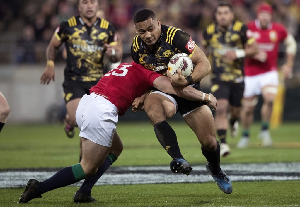 Hurricanes inside centre Ngani Laumape is tackled by the British & Irish Lions Leigh Halfpenny. Photo: AP Hurricanes inside centre Ngani Laumape is tackled by the British & Irish Lions Leigh Halfpenny. Photo: AP