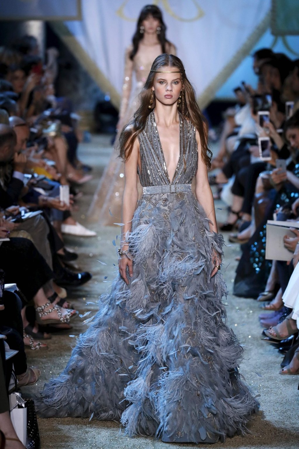 Feathered gowns by Saab. Photo: AFP Feathered gowns by Saab. Photo: AFP