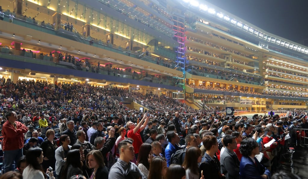 Happy Valley packs the punters in for midweek race meetings under floodlights.