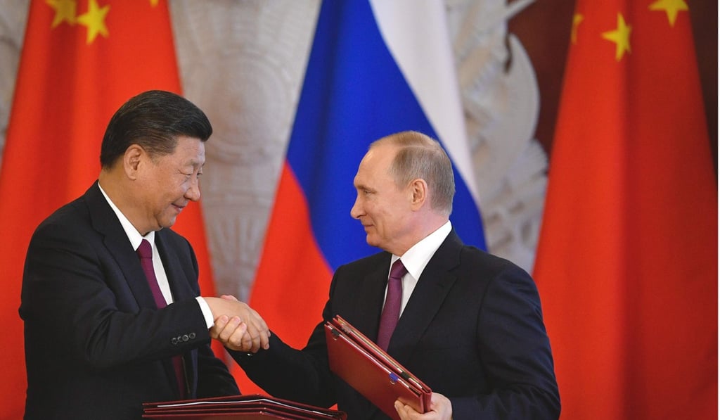 President Xi Jinping and his Russian counterpart Vladimir Putin shake hands during a signing ceremony in the Kremlin in Moscow on July 4. The two issued a joint appeal for restraint and non-military resolutions to the Korean crisis. Photo: AFP