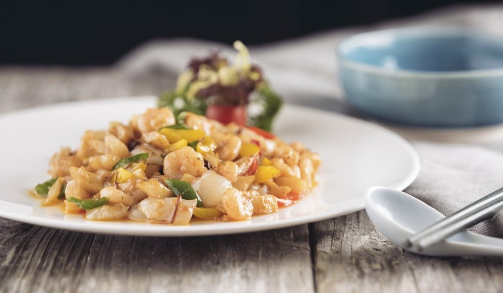 China Tang’s wok-fried shrimp with wild rice stems, lychee and XO chilli sauce.