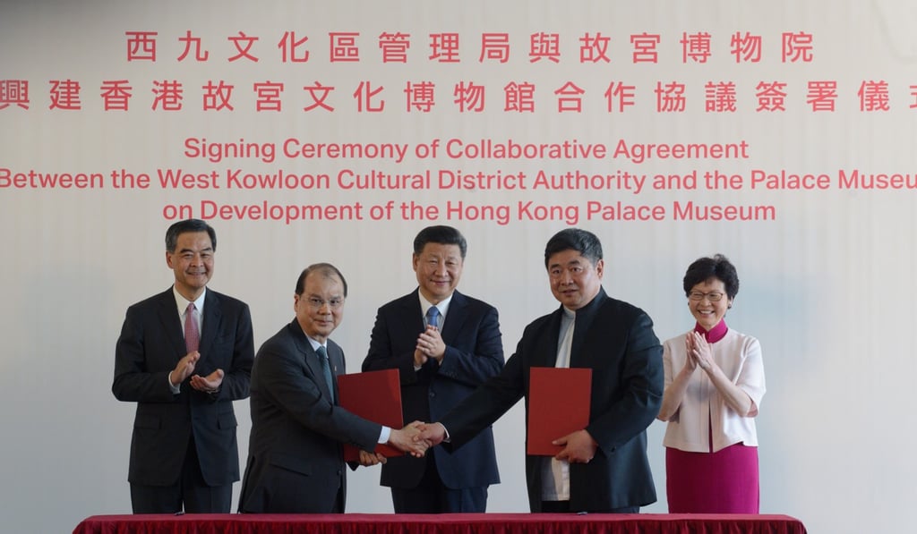 President Xi Jinping, then Hong Kong chief executive Leung Chun-ying and his successor, Carrie Lam, applaud as Chief Secretary Matthew Cheung (second left) and Shan Jixiang, director of the Palace Museum, complete the signing ceremony for the Palace Museum agreement, at the West Kowloon Cultural District on June 29. Photo: SCMP Pictures