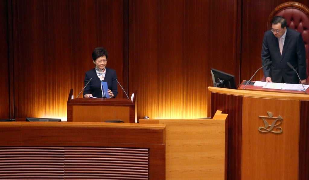 Chief Executive Carrie Lam (left) speaks while standing to the right of Legco president Andrew Leung. Photo: K. Y. Cheng