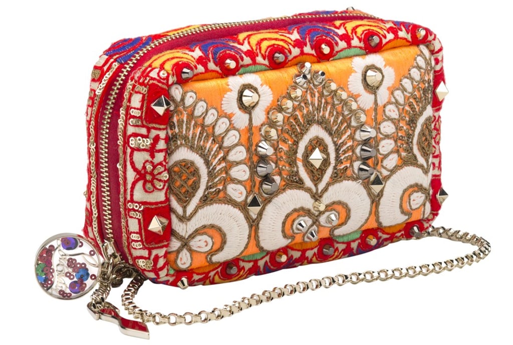 In addition to the multicoloured embroidery, a lightweight chain strap adds an elegant metallic detail to the clutch, HK$14,200