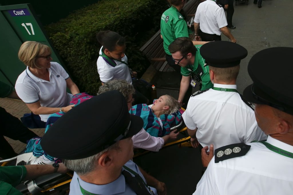 Bethanie Mattek-Sands is wheeled away on a stretcher. Photo: AFP Bethanie Mattek-Sands is wheeled away on a stretcher. Photo: AFP