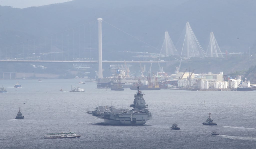 The Liaoning aircraft carrier in Victoria Harbour as seen from Lamma Island. Photo: Felix Wong