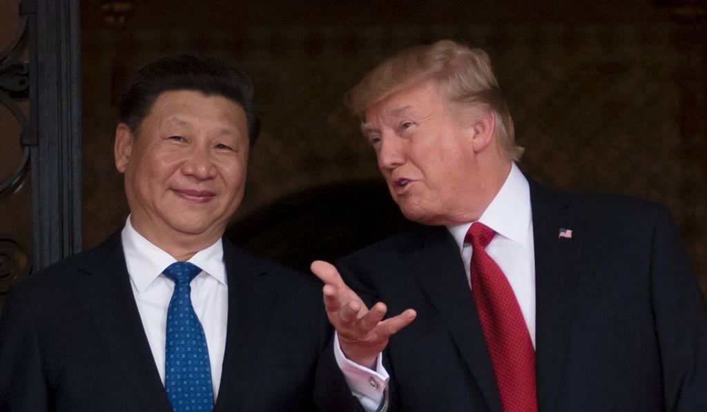 US President Donald Trump, right, welcomes Chinese President Xi Jinping to Trump’s Mar-a-Lago estate in West Palm Beach, Florida, in April. Photo: AFP