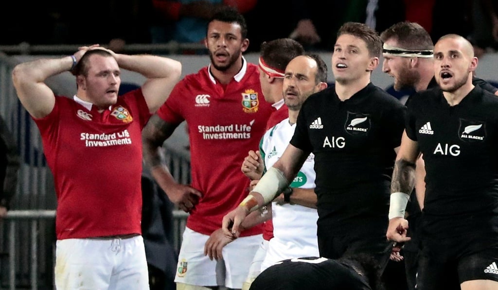 Lions and New Zealand players react at the end of the match. Photo: Reuters