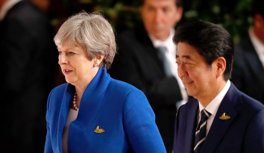 Theresa May and Japan Prime Minister Shinzo Abe at the G20 summit in Hamburg, Germany. Photo: EPA