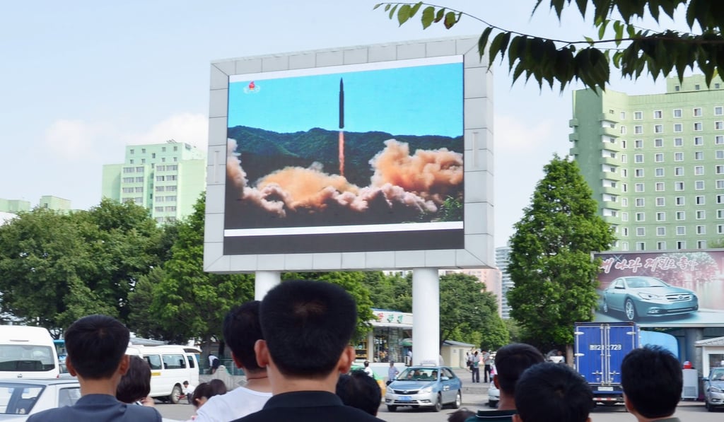 A screen in Pyongyang shows North Korea’s first successful launch of an intercontinental ballistic missile. Photo: Kyodo
