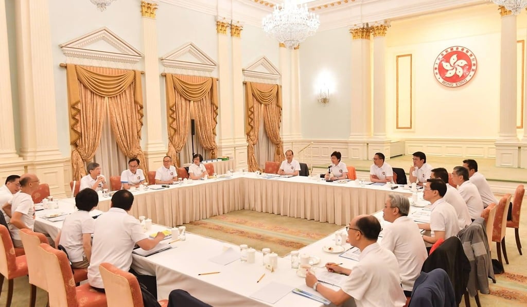 The team gets down to business in Government House. Photo: Facebook