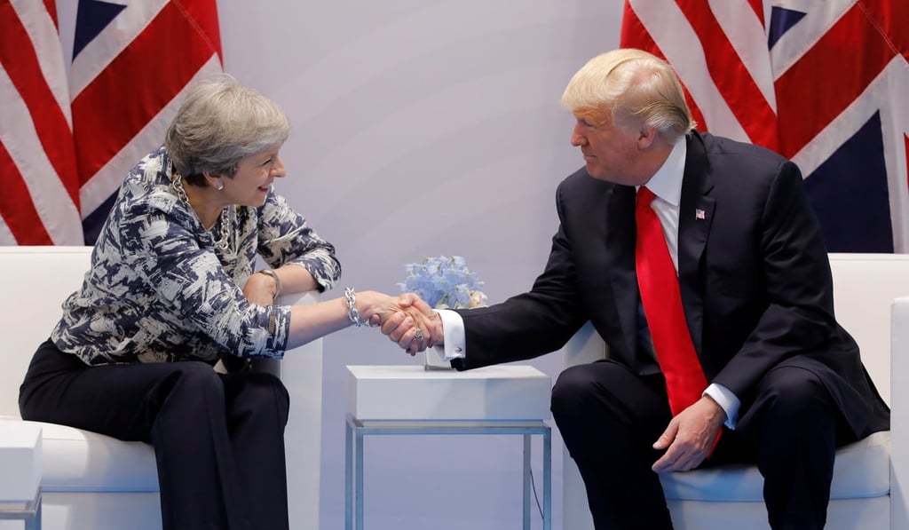 Britain's Prime Minister Theresa May talks with US President Donald Trump near the close of the G20 leaders summit. Photo: Reuters