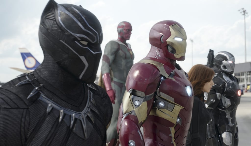 Black Panther/T'Challa (left), with Vision, Iron Man/Tony Stark, Black Widow/Natasha Romanoff, and War Machine/James Rhodey