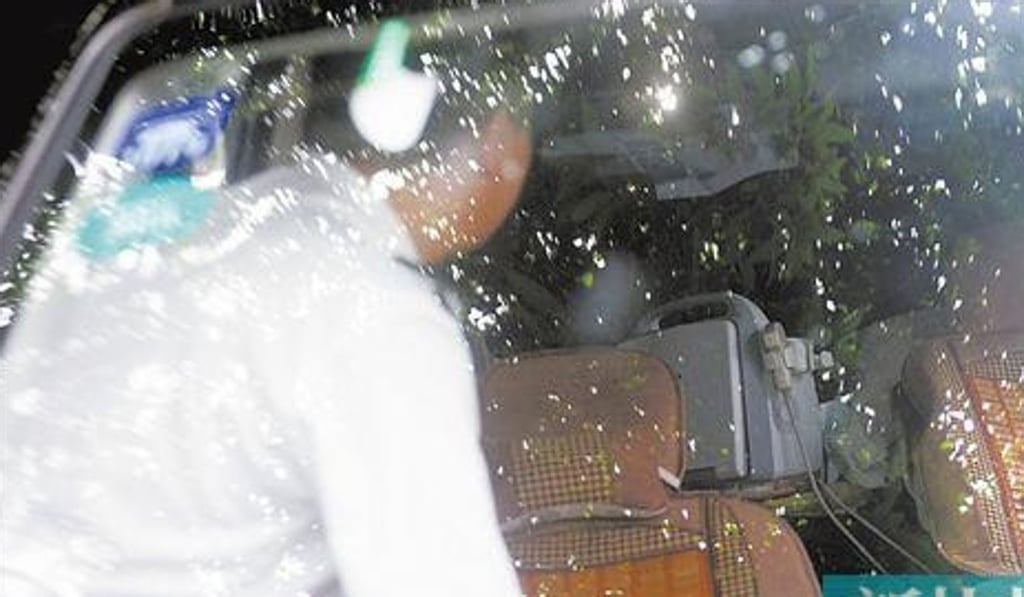 An ultrasound machine can be seen in the back of the minivan as a police officer investigates. Photo: Handout