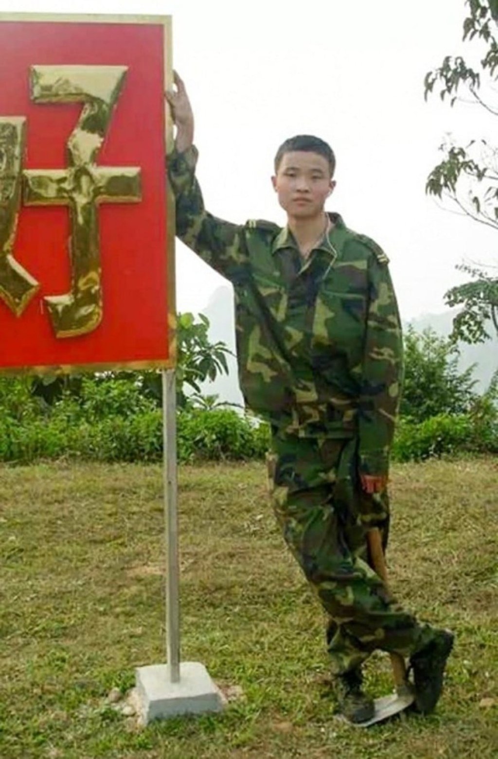 Hero Xu Qiankai is pictured in uniform from his time in the Chinese military. Photo: Handout